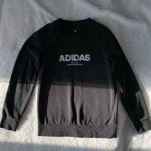 An Adidas black sweeter. Size medium.